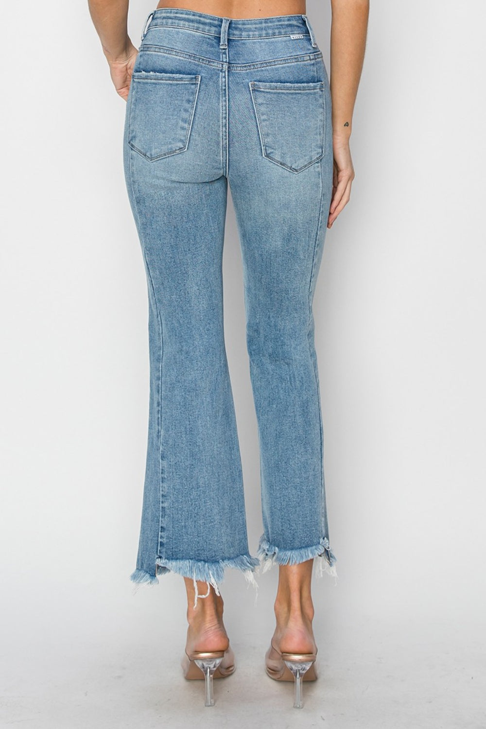 Risen High Rise Frayed Hem Flare Jeans